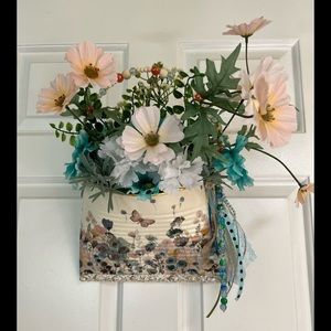 Decorated over size tin can